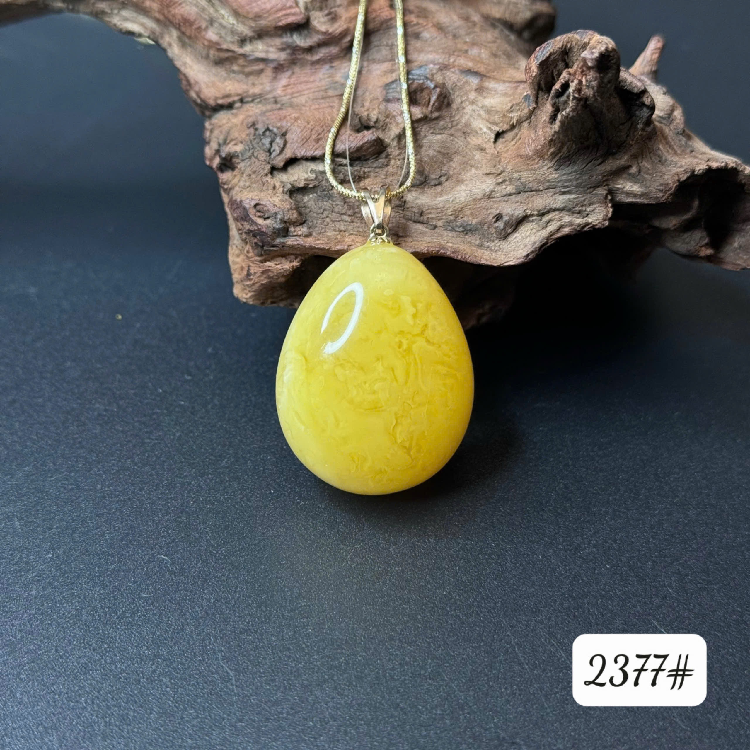 Mặt dây chuyền vàng vân sữa 2377