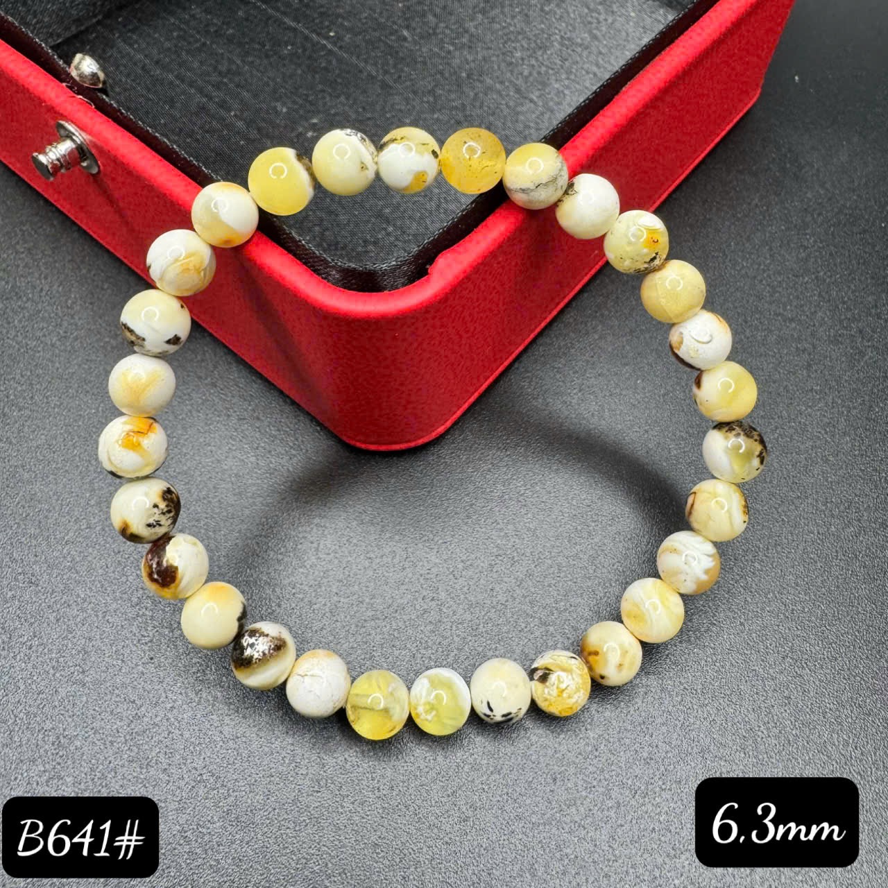 Lắc tay mộc bạch B641